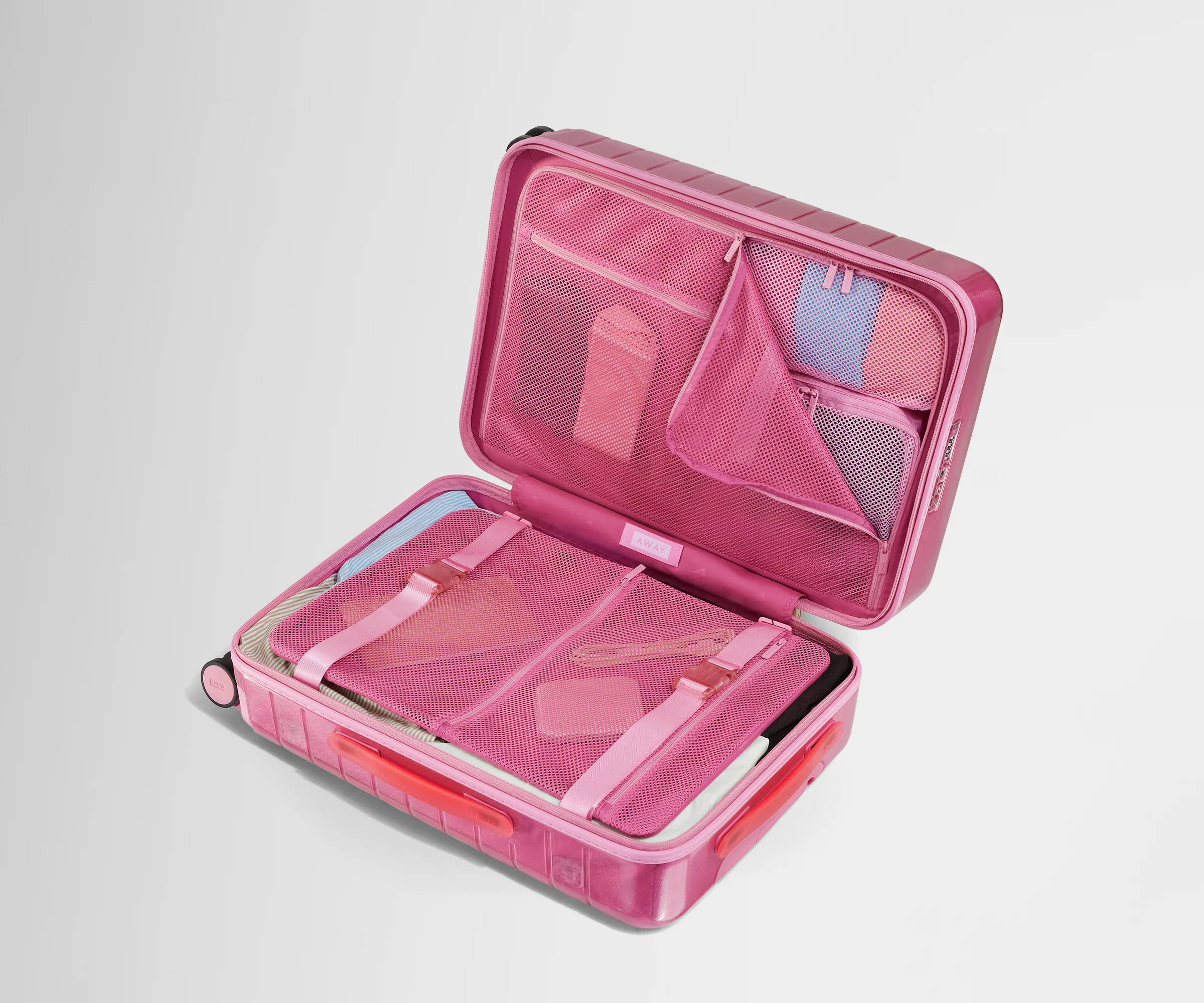 The Bigger Carry-On in Translucent Pink - Image 5