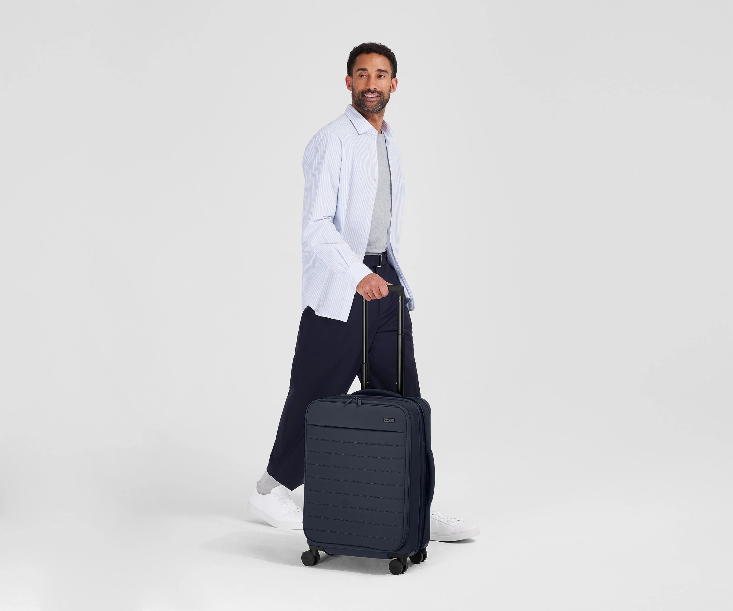 The Softside Bigger Carry-On in Navy Blue - Image 4