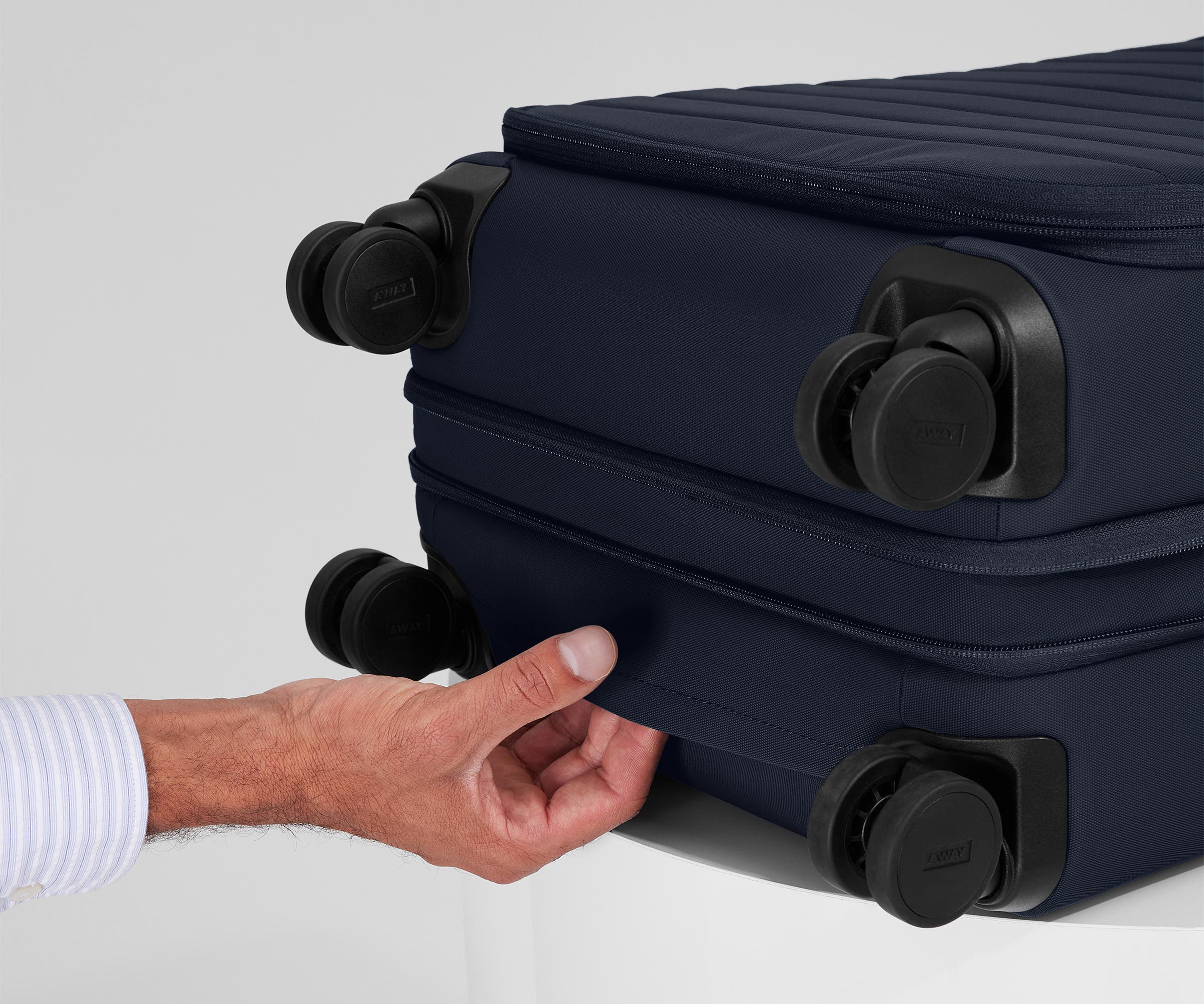 The Softside Bigger Carry-On in Navy Blue - Image 9