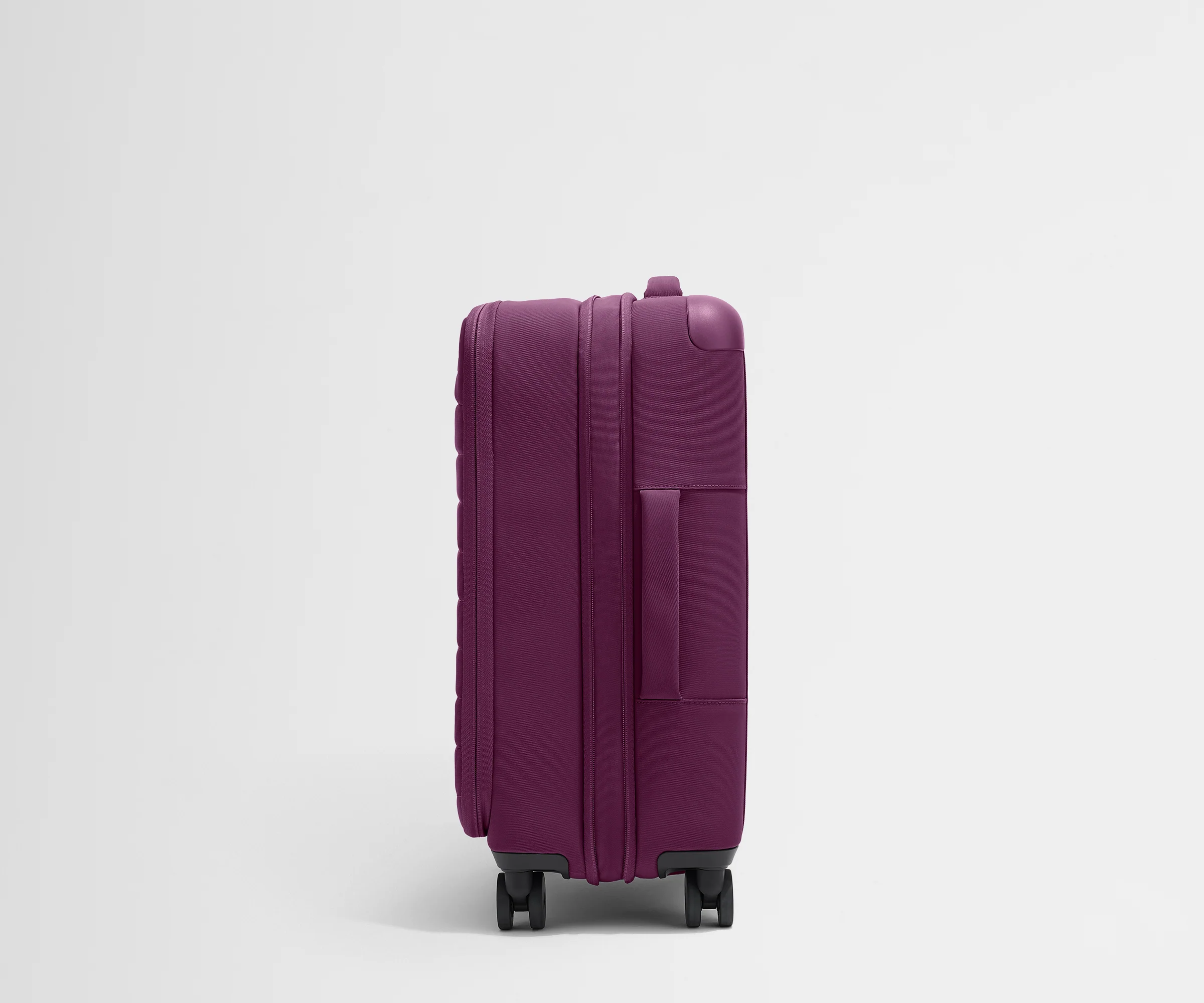 The Softside Bigger Carry-On in Plum Purple - Image 3