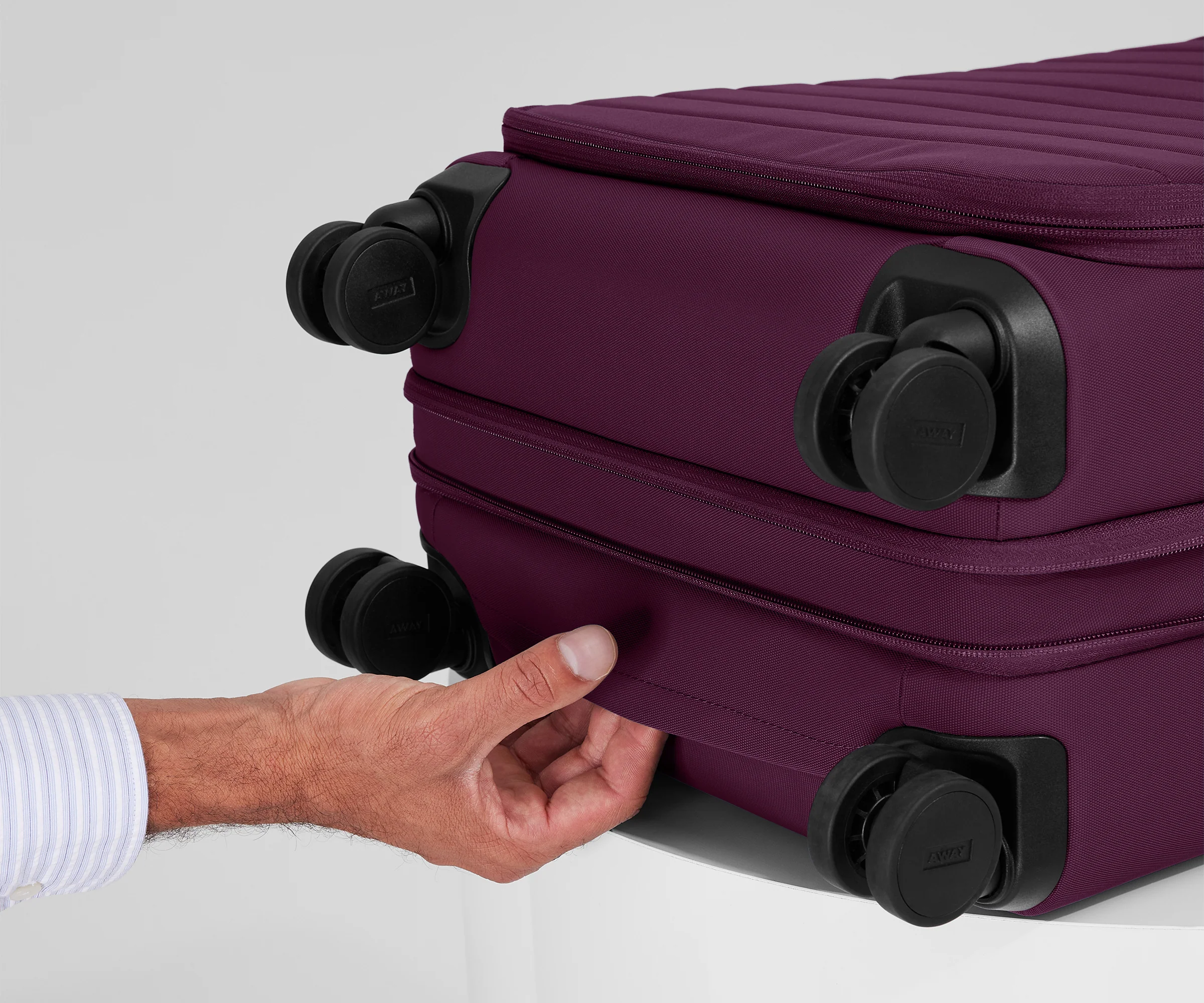 The Softside Bigger Carry-On in Plum Purple - Image 8