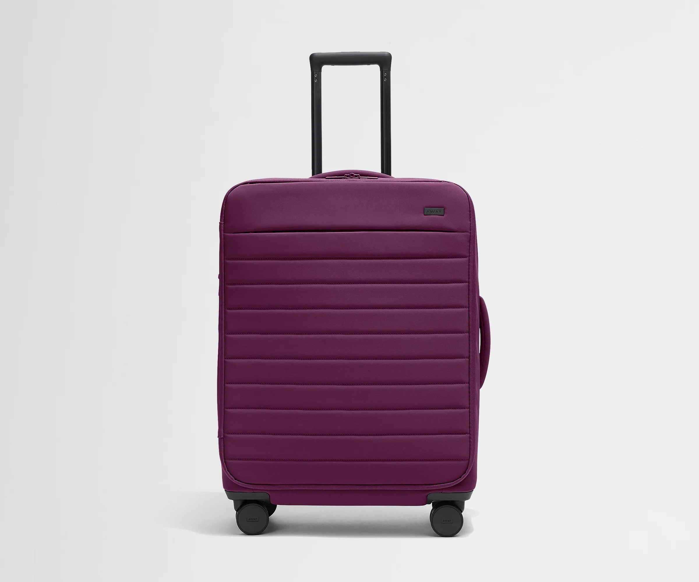 The Softside Medium in Plum Purple